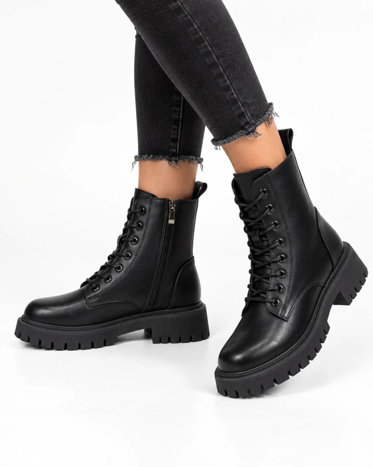 Delphine Botas de invierno negras de cuero